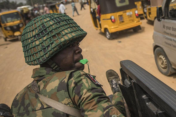 A Nigerian soldier looks on during a military patrol in a pro-Biafra zone in the southeastern city of Aba. Cristina Aldehuela/AFP/Getty Images