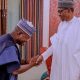 Governor Yahaya Bello bowing to President Muhammadu Buhari