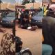 Police officers roll patrol car over handcuffed man