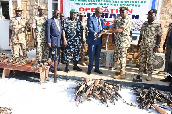 Nigerian Army hands over recovered small arms, light weapons and ammunition to the National Centre for the Control of Small Arms and Light Weapons.