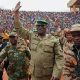 Leader of the Niger Republic junta General Abdourahmane Tchiani acknowledging cheers from admiring crowd