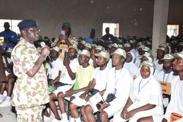 National Youth Service Corps (NYSC) Director General, Brigadier General Y. D. Ahmed, addressing Corps Members