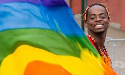 Man displays during a Lesbian, Gay, Bisexual, Transgender or Queer (LGBTQ) rally
