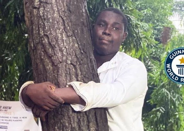 Ghanaian Journalist sets Guinness World Record for longest tree hug