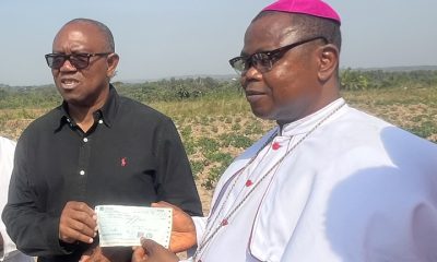 Peter Obi (left) presenting a cheque of 20 million Naira to the Auxiliary Bishop of the Catholic Diocese of Enugu, Most Rev. Dr. Ernest Obodo to support the expansion of the Diocesan Mary Agro farms at Omughu . . . Wednesday, November 20, 2024
