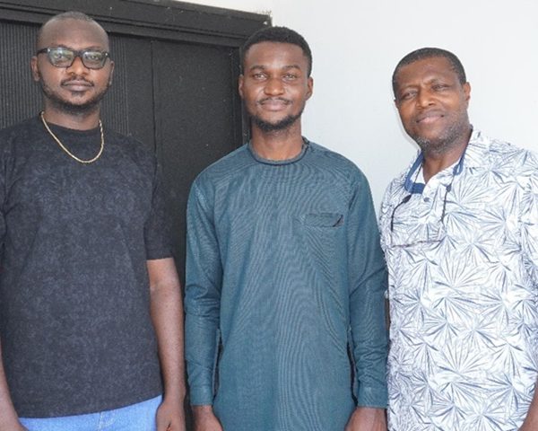 United Nations Development Programme (UNDP) representative, Chukwuka Zikora, flanked by Diaspora Digital Media (DDM) officials, Tim Elo (right) and Tobechukwu Mmadubuike (left) during the former's visit at DDM Villa, Awka, December 11, 2024