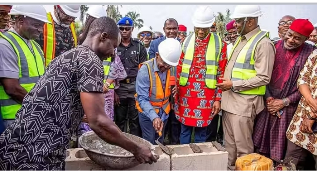 Governor Otti (middle) performing the groundbreaking 