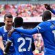 Everton players celebrating Ndiaye's equalizer