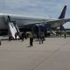 Passengers evacuate Delta plane