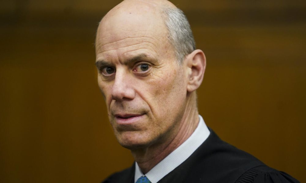 US Judge says to hold Trump for contempt of court