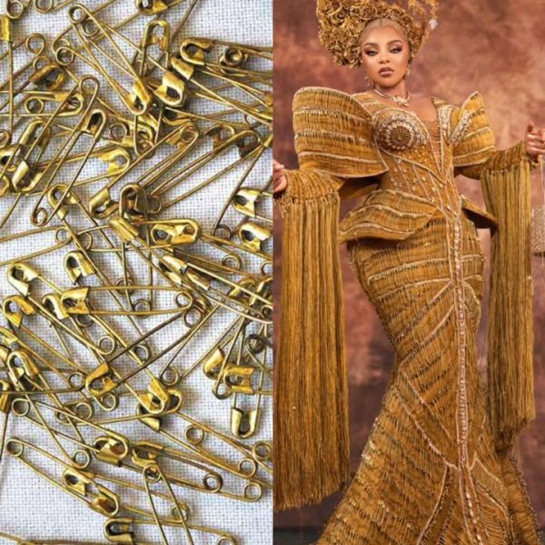 Queen Mercy Atang turns heads at 2025 AMVCA with daring safety pin gown