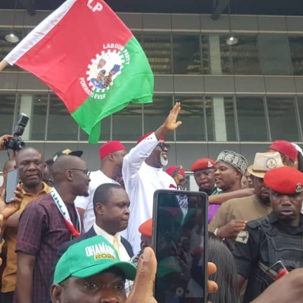 Chief Dr. George Moghalu arrives to a rousing reception as the 