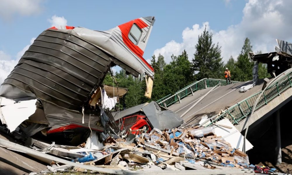 Russia blames explosions for train derailment
