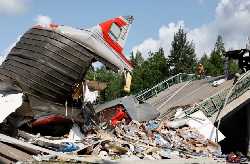 Russia blames explosions for train derailment