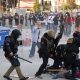 Tensions mount in LA, police and protesters clash over immigration raids