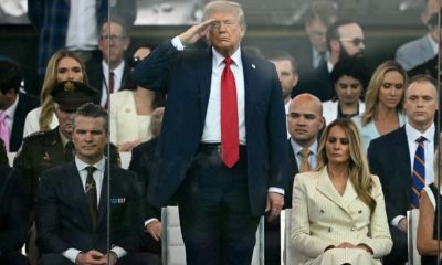 Trump goes on with military parade amid protests across US
