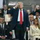 Trump goes on with military parade amid protests across US