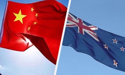 China and New Zealand flags.