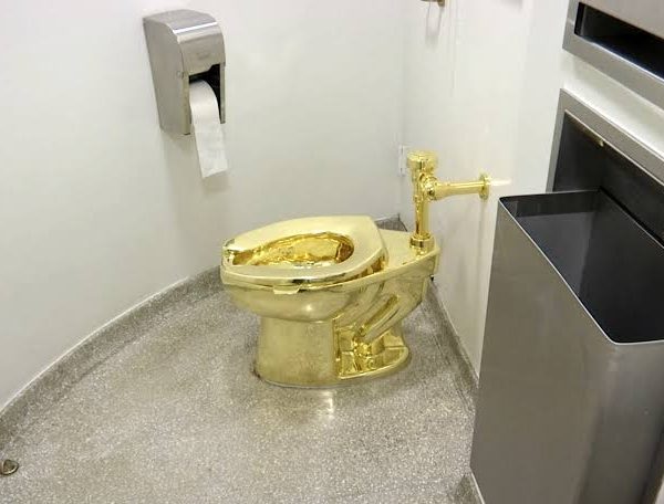 Two men behind bars for stealing $6M golden toilet from Churchill’s birthplace
