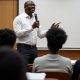 Lecturer teaching students in a classroom