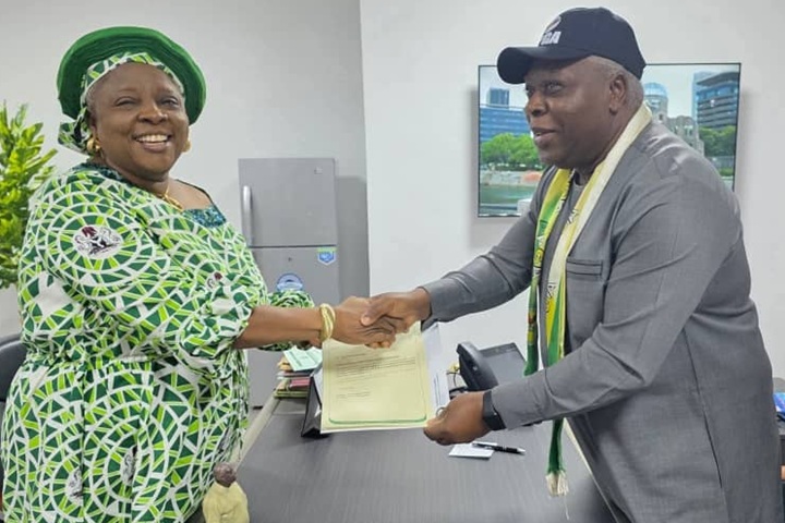 Secretary to the State Government, Professor Solo Chukwulobelu, presenting formal appointment letter to Professor Kate Azuka Omenugha as substantive Vice Chancellor of Chukwuemeka Odumegwu Ojukwu University (COOU), Anambra State