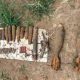 Police uncover bombs, ammunition hidden in scrap 
