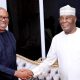 Ex-Anambra State governor, Peter Obi, in a warm handshake with ex-Vice President Atiku Abubakar