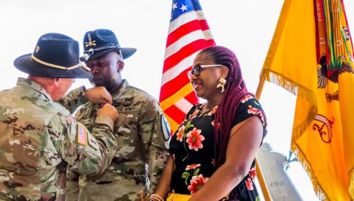 JUDE OKPALA RECEIVING AWARD OF DISTINGUISHED FLYING CROSS IN WASHGINTON.